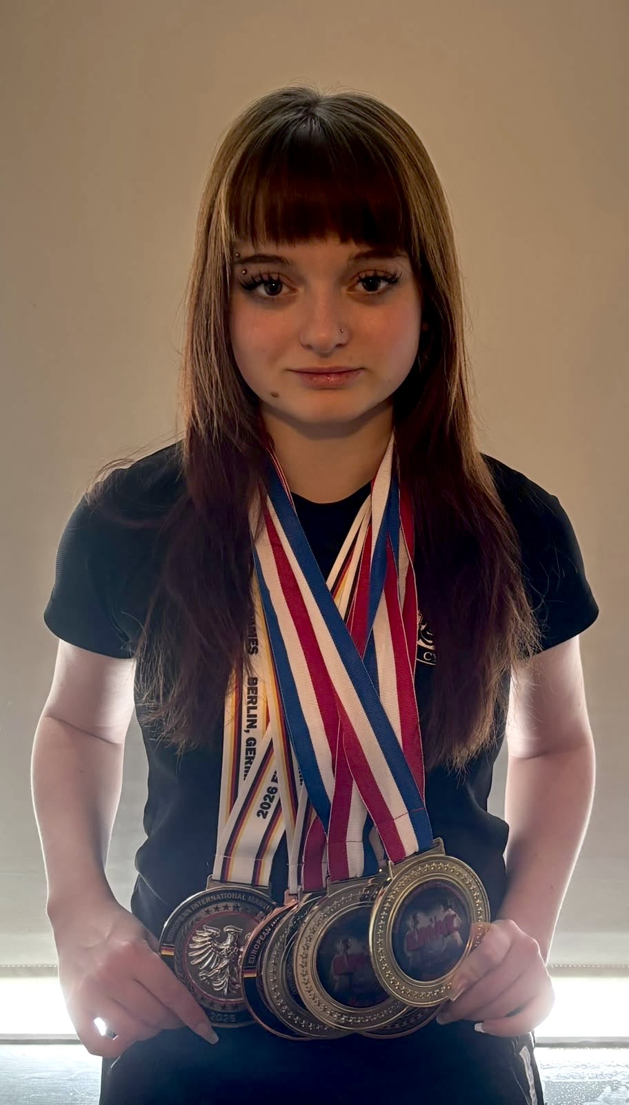 Erin Holdstock with medals